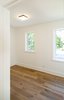 Modern home with Medium Hardwood Floor, Ceiling Lighting, and Living Room. 1733 Bathurst - Bedroom Photo 5 of 1733 Bathurst