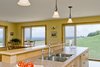 Modern home with Kitchen and Concrete Floor. Black Bank Hill - Great Room Photo 8 of Black Bank Hill