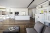 The interior functions are separated by partitions while ensuring all are facing the open view. The lower structure delivers an open space that is connected to the outside. Photo 8 of The Dual House modern home