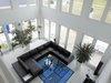 Two story high living room, surrounded by walls of windows (Marvin windows) to allow a lot of light and views to the garden and pond. Photo 2 of Modern Mediterranean modern home