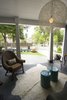 Covered Porch with modern fixtures Photo 15 of Historic Bungalow modern home