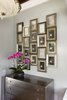 Updated front entry, custom framing of family artwork Photo 5 of Historic Bungalow modern home