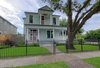 Victorian Farmhouse with restored front door & gas lanterns Photo 2 of Victorian Restoration modern home