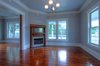 Living Room with restored fireplace. Photo 6 of Victorian Restoration modern home