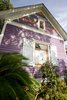Details of the new shutters. Shutters are functional and can be closed in the event of a hurricane or inclement weather to safeguard the heritage glass. Photo 5 of Modern Victorian Exterior modern home