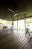 New stained deck, new stained headboard ceiling and modern fans to provide airflow in Houston's muggy weather. Photo 10 of Modern Victorian Exterior modern home