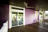 A new back door with transom to allow more light into the home and to encourage flow during entertaining. Photo 12 of Modern Victorian Exterior modern home
