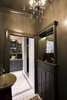 Additional Storage - The old door to the powder room was moved to the remodeled kitchen - and the old doorway was utilized to add additional storage to the Powder room without impinging on floor space in the 4 x 6 space. Photo 20 of Modern Victorian Interior modern home
