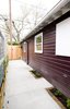 A new patio was built for more exterior space for the homeowner and their renters. Hardscaping and landscaping were installed with an eye towards maintenance. Photo 4 of Asian Bungalow modern home