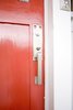 New door hardware with accents that mimicked the mailbox screen kept a flow to the home. Photo 9 of Asian Bungalow modern home