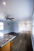 The living and bedroom areas flowed together while the closet and bathroom were placed side by side to give the space a larger feel. Photo 7 of Asian Bungalow - Garden Apartment modern home