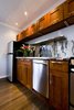 An updated kitchen with plenty of storage and high end finishes set this apartment apart from the competition. Photo 2 of Asian Bungalow - Garden Apartment modern home