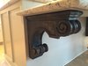 The corbels holding up the lower island shelf were selected to allow a wheel chair to pass underneath them to provide maximum flexibility for the homeowners. Photo 7 of ADA Kitchen modern home