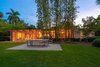 Back exterior Photo 2 of The Coach House modern home