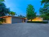 front, evening, showing stacked ocala block, clerestory windows and beams through home, sarasota school of architecture - seibert architects mid-century modern traits Photo 11 of The Coach House modern home