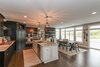Large chef inspired kitchen with custom two tone design Photo 5 of Modified Amelia II Model by DJK Homes modern home