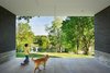 The carport frames a wonderful view of the river beyond and provides a sheltered play area during rain or excessive heat Photo 15 of Boetger Residence modern home
