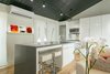 Laundry?...check behind the cabinet doors to the right of the microwave! Photo 3 of Sandy Cove modern home