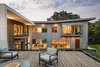 Modern home with Outdoor, Rooftop, Wood Patio, Porch, Deck, and Landscape Lighting. Taula House by M Gooden Design | Roof Deck Photo 10 of Taula House