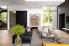 Modern home with Living Room, Chair, Recessed Lighting, and Light Hardwood Floor. Taula House by M Gooden Design | Living Room Photo 19 of Taula House