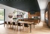 Modern home with Pendant Lighting, Light Hardwood Floor, Recessed Lighting, and Chair. Taula House by M Gooden Design | Dining // Kitchen Photo 20 of Taula House
