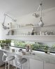 Modern home with Kitchen, Marble Counter, Dark Hardwood Floor, and Wall Lighting. Breakfast Counter Photo 9 of Brooklyn Row 1