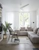 Modern home with Living Room, Chair, Sectional, Bookcase, Ceiling Lighting, Wall Lighting, Dark Hardwood Floor, Wood Burning Fireplace, and Table Lighting. Living Room Photo 13 of Brooklyn Row 1