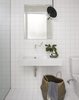 Modern home with Bath Room, Ceramic Tile Floor, Wall Mount Sink, Open Shower, Ceramic Tile Wall, One Piece Toilet, and Pendant Lighting. Bathroom Photo 18 of Brooklyn Row 1