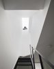 Modern home with Staircase, Metal Tread, and Metal Railing. Stairwell with skylight Photo 19 of Brooklyn Row 1