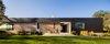 Modern home with Exterior, House Building Type, Flat RoofLine, Wood Siding Material, and Metal Siding Material. Front Facade Photo 2 of Watermill House