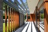 Modern home with Outdoor and Walkways. Walkway from south terrace to front entry Photo 6 of Council Crest Residence