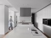 Spacious table top serves as cooking, dinning, and working surface. Photo 2 of KT Apartment modern home