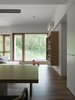 Look out to the the forest outside from the deepest space of the interior. Photo 6 of H Residence modern home