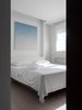 Modern home with Bedroom, Recessed Lighting, Bed, and Light Hardwood Floor. A glimpse of bedroom. Photo 6 of W Residence