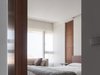 Modern home with Bedroom, Bed, Recessed Lighting, and Light Hardwood Floor. A glimpse of master bedroom, with movable wall hides away the secret balcony. Photo 8 of W Residence