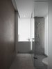 Modern home with Bath Room, One Piece Toilet, Recessed Lighting, Engineered Quartz Counter, Drop In Sink, and Ceramic Tile Wall. Guest Bathroom. Photo 11 of W Residence