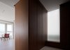 Modern home with Hallway and Light Hardwood Floor. View of the living area through the entrance. Photo 17 of W Residence