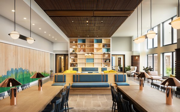 Warm wood and copper details, along with Tom Slazinski's dip-dyed wall create an intimate and inviting lounge and work space.