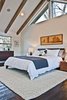 Master retreat has vaulted ceilings with patio deck for views of golf course and city park. Photo 8 of Modern Barn Revival modern home
