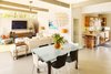 Modern home with Dining Room, Pendant Lighting, Chair, Ceramic Tile Floor, and Table. Dining Area Photo 2 of Waters Edge. Private Meiselman Mid-Century Modern with Views and Stunning Saltwater Pool