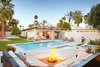 Modern home with Outdoor, Boulders, Back Yard, Grass, Desert, Shrubs, Decomposed Granite Patio, Porch, Deck, Trees, Salt Water Pools, Tubs, Shower, Concrete Patio, Porch, Deck, Pavers Patio, Porch, Deck, Wood Fences, Wall, Landscape Lighting, Large Pools, Tubs, Shower, Hardscapes, Swimming Pools, Tubs, Shower, Large Patio, Porch, Deck, Concrete Fences, Wall, and Retaining Fences, Wall. Outdoor Living Photo 3 of Waters Edge. Private Meiselman Mid-Century Modern with Views and Stunning Saltwater Pool
