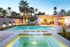 Modern home with Exterior, Stucco Siding Material, Mid-Century Building Type, House Building Type, and Flat RoofLine. Evening Play Photo 4 of Waters Edge. Private Meiselman Mid-Century Modern with Views and Stunning Saltwater Pool