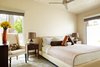 Modern home with Bedroom, Table Lighting, Storage, Wardrobe, Chair, Bed, Night Stands, Carpet Floor, and Track Lighting. Master King Photo 6 of Waters Edge. Private Meiselman Mid-Century Modern with Views and Stunning Saltwater Pool