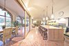 Kitchen and living area opens out to the North-facing sunroom Photo 3 of underground house modern home