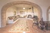 Recycled bricks from a former home frame the arched windows Photo 5 of underground house modern home