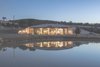 Simple low-maintenance landscape reflects the farm environment Photo 6 of underground house modern home