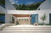 The terrace/patio that connects the two houses Photo 2 of House U modern home