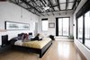 Master bedroom opens onto wrap around balcony terrace. Photo 6 of Studio GoodLight modern home