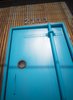 front entrance, custom over-sized pivot door hand-crafted by the Funktion Art Design Compound. Photo 11 of Studio GoodLight modern home