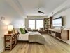 Modern home with Bench, Shelves, Bedroom, Light Hardwood Floor, and Bookcase. Master Bedroom Photo 2 of POLO PROJECT